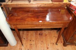 Victorian mahogany and line inlaid fold top tea table having frieze drawer and raised on square