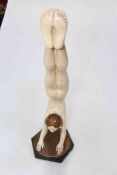 Art Deco plaster figure of a female acrobat.