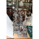 Collection of ten spelter figures including Royalty, Jockey, lamp with shade, etc.
