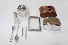 Pair gents silver backed brushes in leather case, silver topped preserve, silver frame, two spoons,