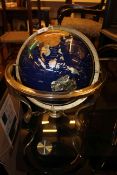 Brass and semi-precious stone terrestrial globe.