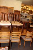 Slim teak display unit, set of four teak dining chairs and teak nest of three tables (6).
