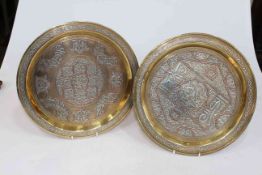 Pair brass Islamic dishes with silver and copper inlay, 32cm diameter.