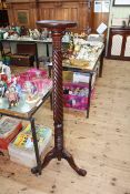 Pair mahogany carved and twist column torcheres on triform bases, 136cm.