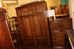 Three piece carved oak bedroom suite and double headboard.