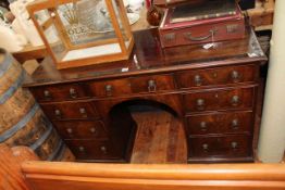 19th Century mahogany crossbanded nine drawer pedestal desk, 79cm by 123cm by 46cm.