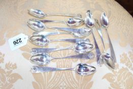 Set of eleven Continental 19th Century silver teaspoons with shell terminals.
