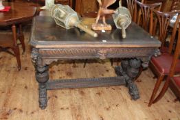 Victorian rectangular carved oak centre table having frieze drawer,