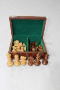 Chess set in brass bound wooden box.