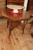 Late Victorian octagonal centre table raised on turned legs joined by undershelf and cross