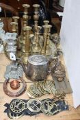 Collection of brass candle holders, horse brasses, door knocker, silver plated teapot, etc.