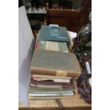 A good collection of local interest scrapbooks, books and postcards.