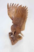 Carved eagle, 40cm high.