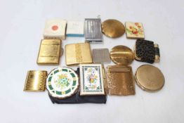Collection of vintage compacts including Stratton, Revlon, etc.