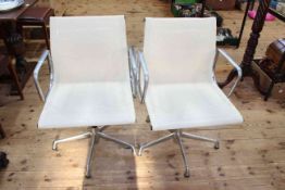 Pair of ICF Charles Eames design swivel chairs.