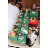 Fifteen boxed Beano Dandy figures, and Beswick Siamese cat.