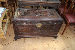 Oriental carved camphorwood trunk, 60cm by 101cm by 52cm.