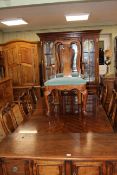 Polished wood ten piece dining suite comprising display cabinet,