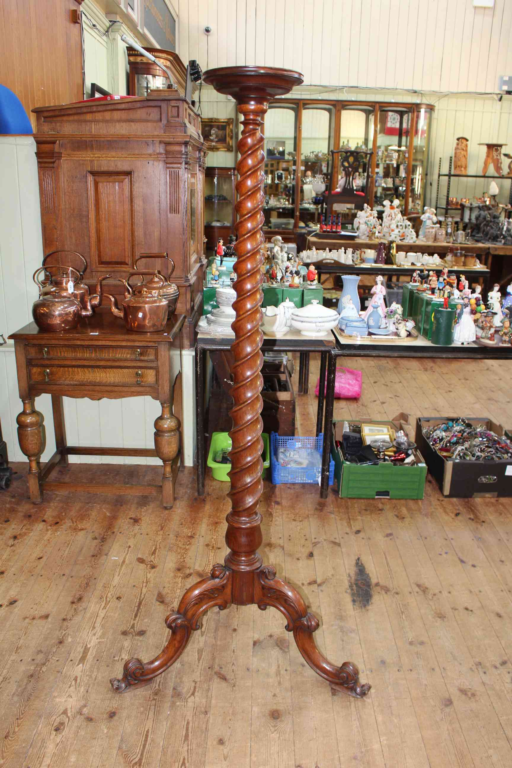 Tall twist column torchere on triform base, 165.5cm.