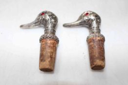 Pair white metal Duck wine bottle stoppers (with receipt for purchase in 2008).