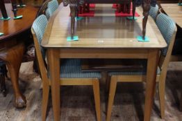 Vintage teak rectangular extending dining table and four chairs.
