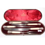 Cased Victorian silver mounted carving set.