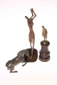 Hagenauer style bronze lady golfer, 25cm, together with bronze horse and jockey figures (3).