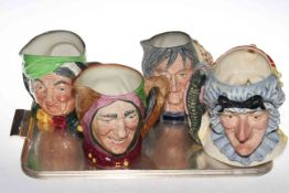 Four Royal Doulton character jugs, Punch & Judy, The Pendle Witch, Touchstone and Sairey Gamp.