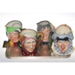 Four Royal Doulton character jugs, Punch & Judy, The Pendle Witch, Touchstone and Sairey Gamp.