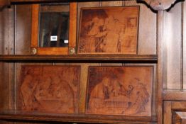 Three lime wood panels, all signed W. Geiger Fecit and a satinwood standing mirror (4).