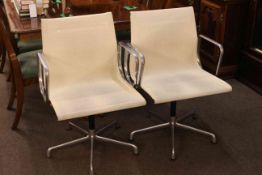 Pair of ICF Charles Eames design swivel chairs.