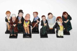Collection of nine Royal Doulton Dickens figures.