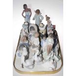 Fourteen Nao figures and one Lladro piece of Girl on Telephone.
