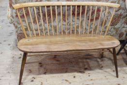 Vintage Ercol beech and elm love seat, 113cm.