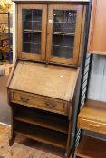 Early 20th Century medium oak and leaded glazed door bureau bookcase, 166cm by 78cm by 38cm.