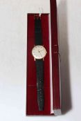 Record de luxe 9 carat gold gents wristwatch (inscribed on reverse), boxed.