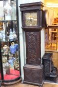 Antique carved oak 30 hour longcase clock having square brass dial signed Tho's Lister.