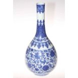 Large Chinese blue and white bottle neck vase with continuous scrolling foliate pattern decoration,
