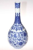 Large Chinese blue and white bottle neck vase with continuous scrolling foliate pattern decoration,