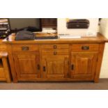 Hardwood three door sideboard and matching entertainment unit.