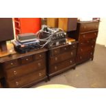 Stag Minstrel five piece bedroom suite comprising seven and five drawer chests,