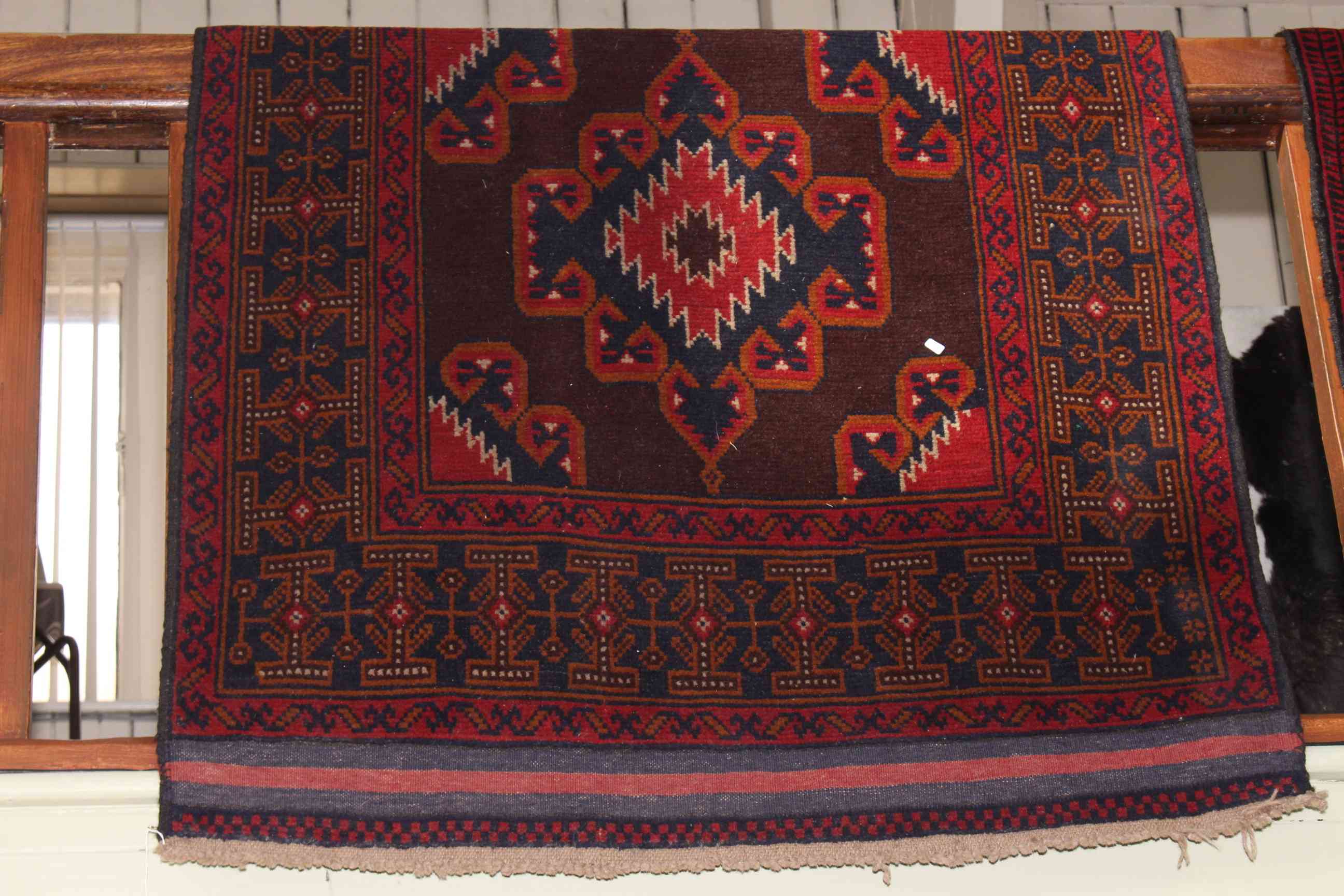 Persian design wool rug 1.90 by 1.08.