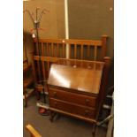 Oak two drawer bureau, Edwardian mahogany double bedstead and hat and coat stand (3).