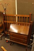 Oak two drawer bureau, Edwardian mahogany double bedstead and hat and coat stand (3).