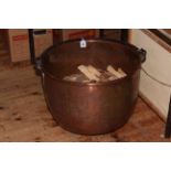 Large copper log bucket with cast iron swing handle, 39cm high.