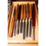Tray of wood turners and chisels.