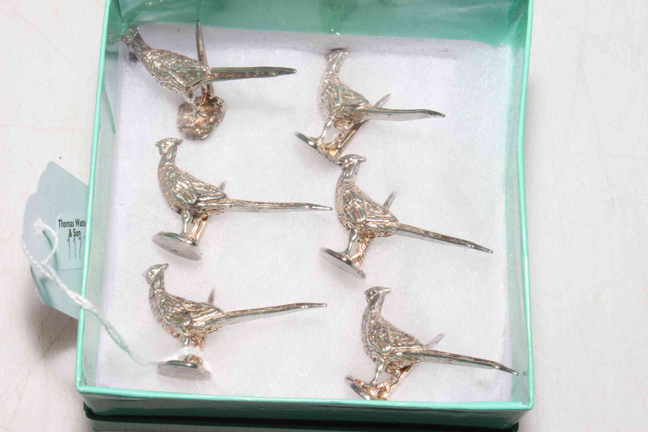 Set of six silver pheasant place name holders.