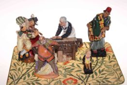 Five Royal Doulton figures, The Carpenter, Carpet Seller, The Fiddler, Falstaff and small Micawber.