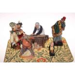 Five Royal Doulton figures, The Carpenter, Carpet Seller, The Fiddler, Falstaff and small Micawber.