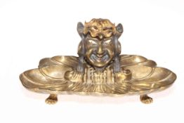 Unusual gilt bronze inkstand with devil mask inkwell, 25cm across.